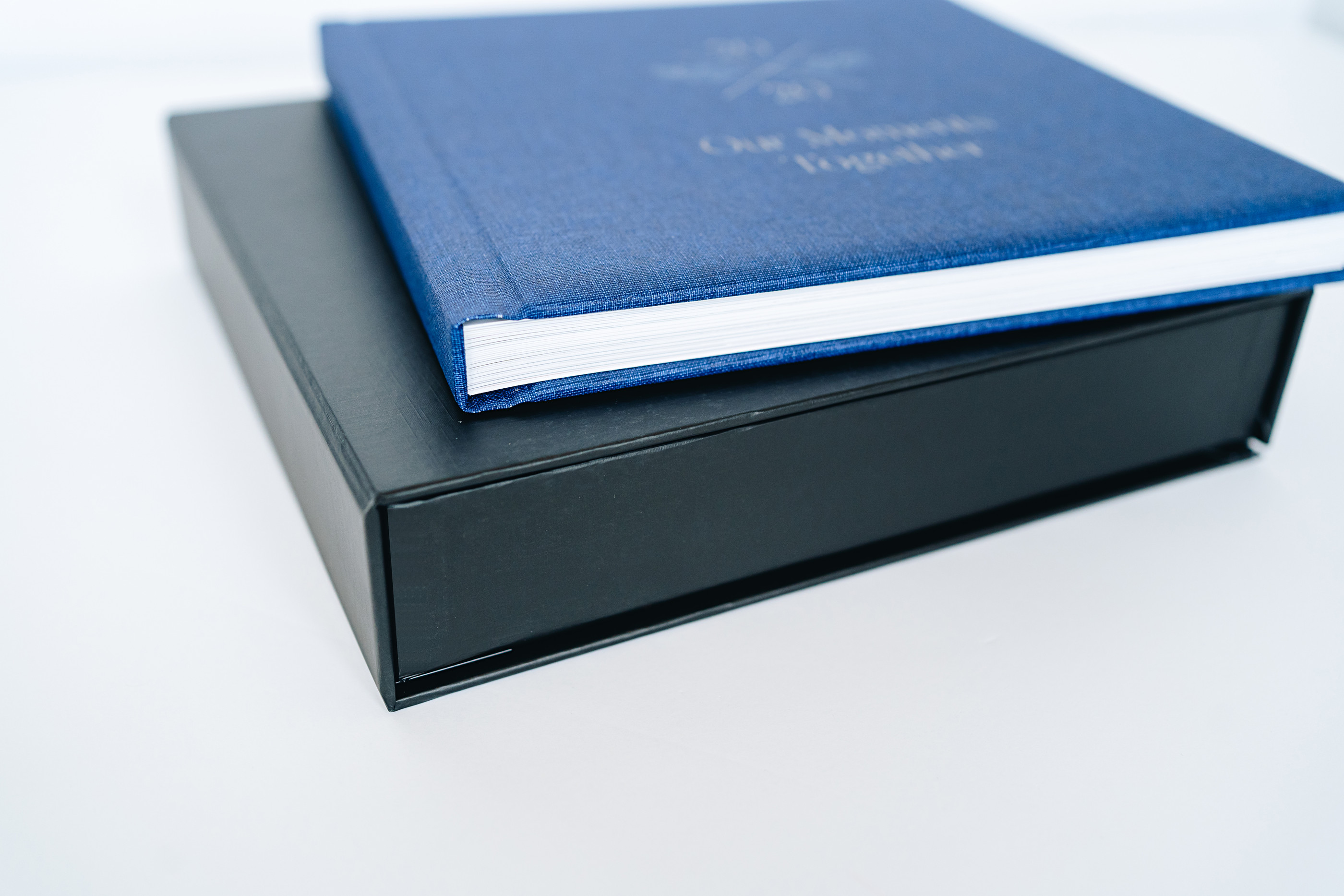layflat photobook on black presentation box