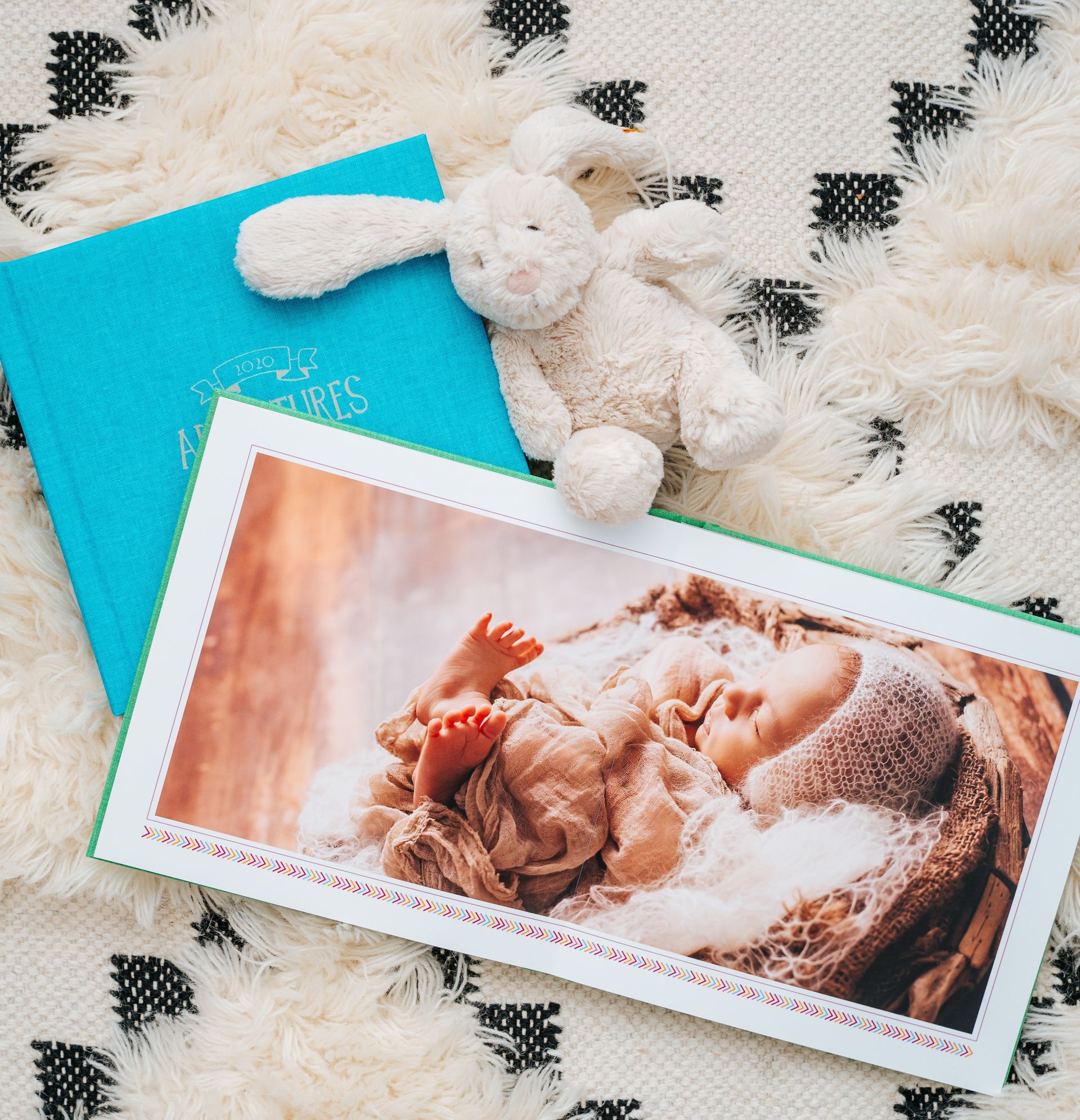 An open baby photo book