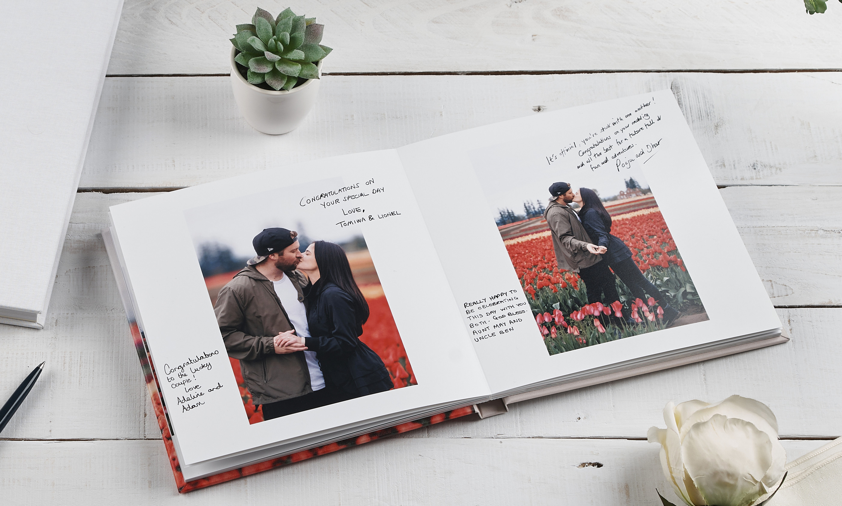 Personalized wedding guest book with photos of couple