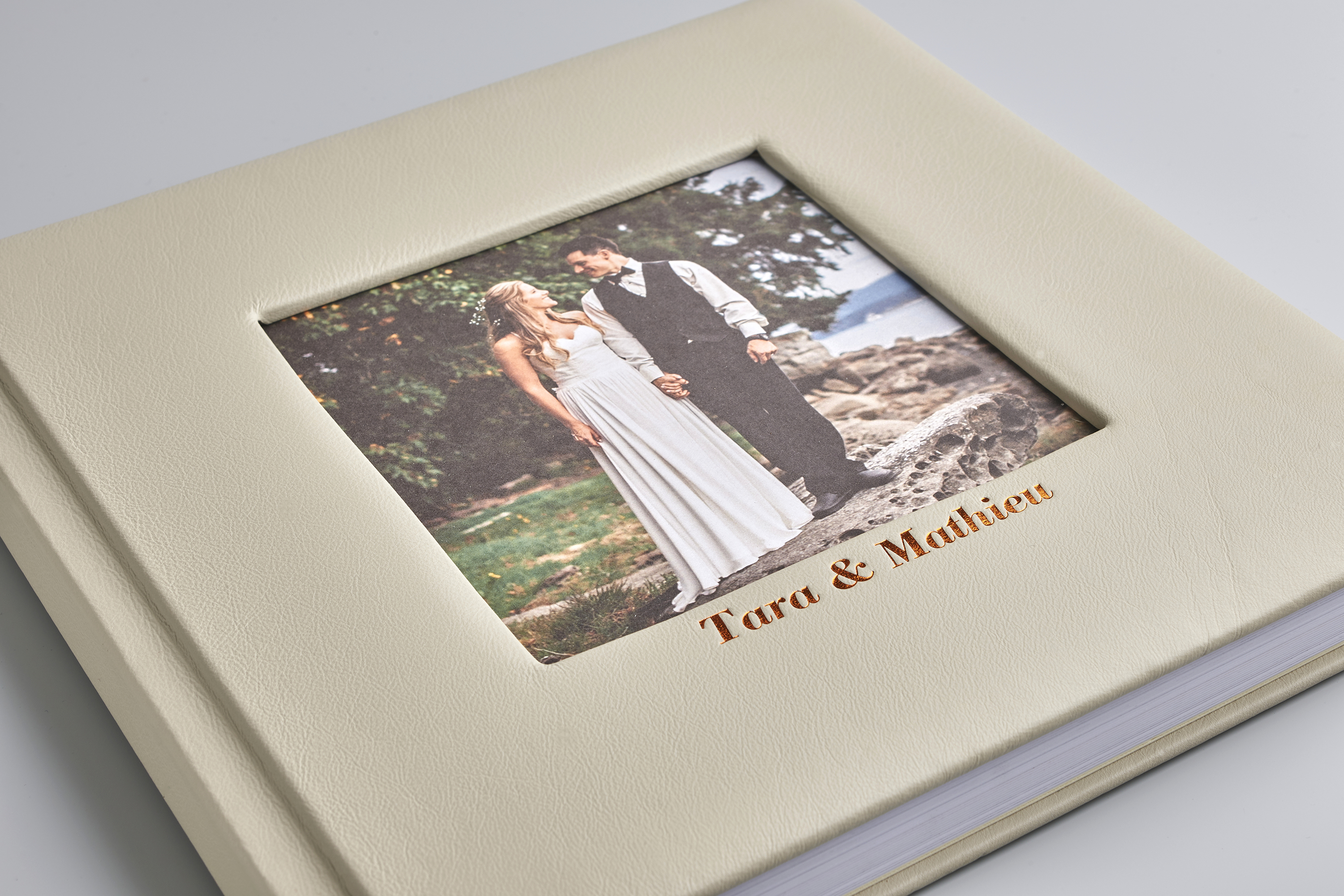 Photo of couple on leather wedding photo album cover.Photo of couple on leather wedding photo album cover.
