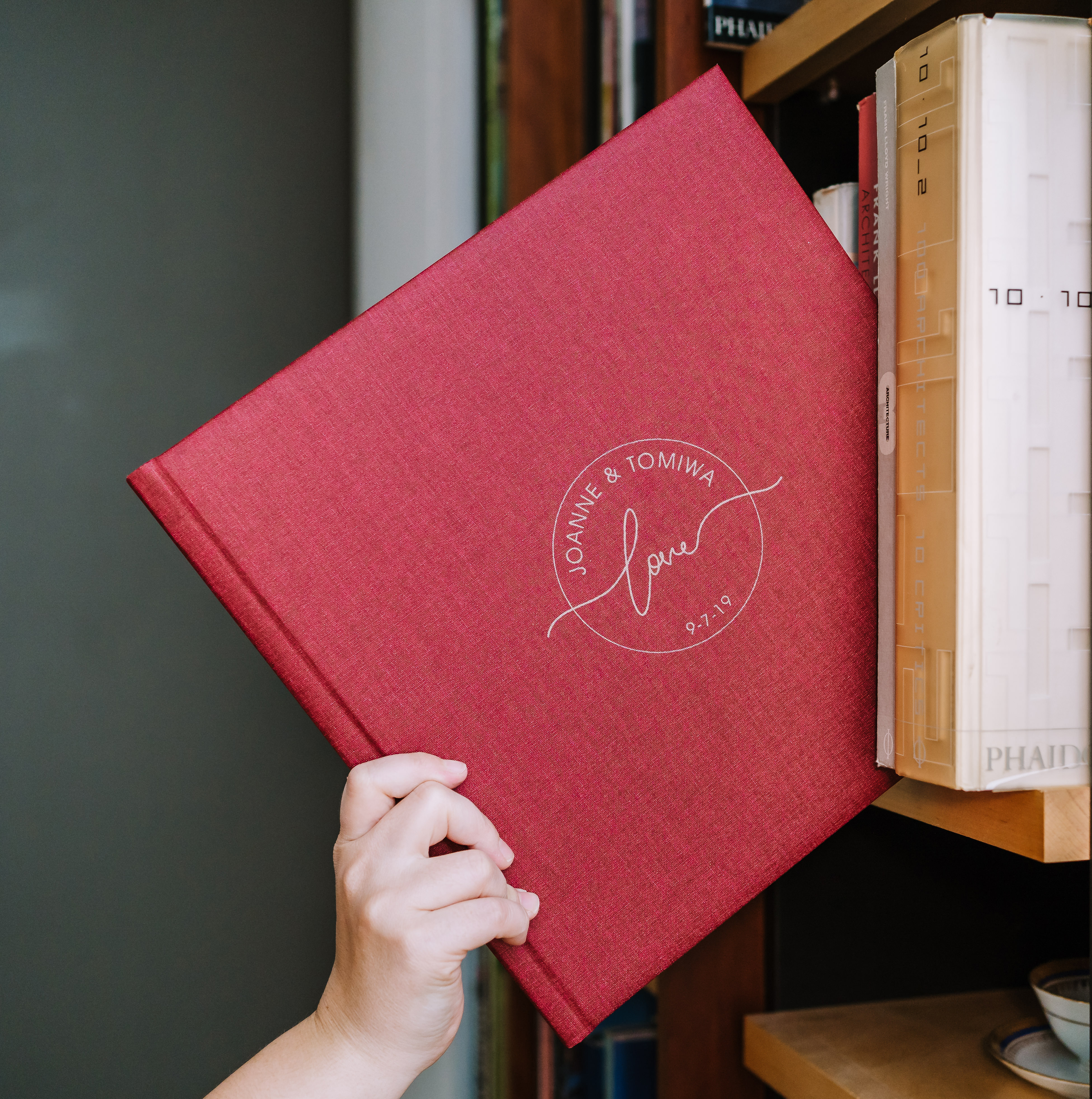 Red linen custom designed engagement photo book