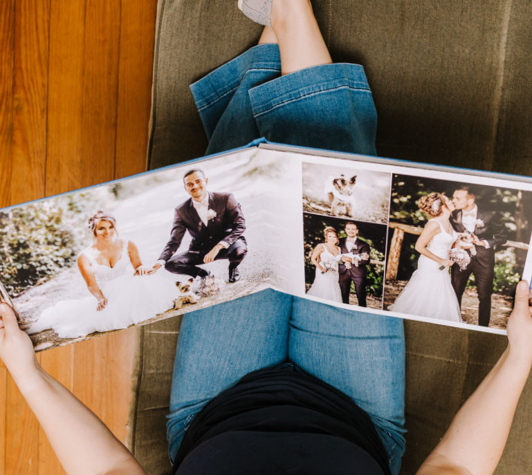 Women viewing a wedding photo album