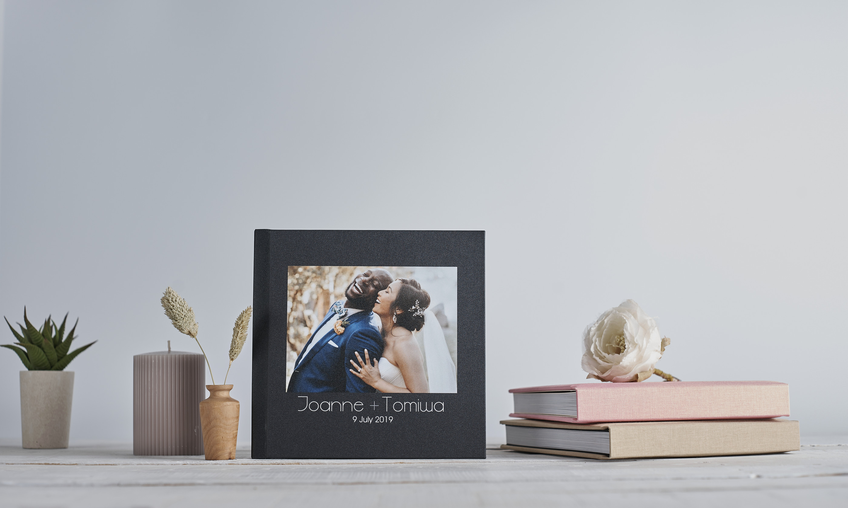 Wedding book showing happy couple on cover