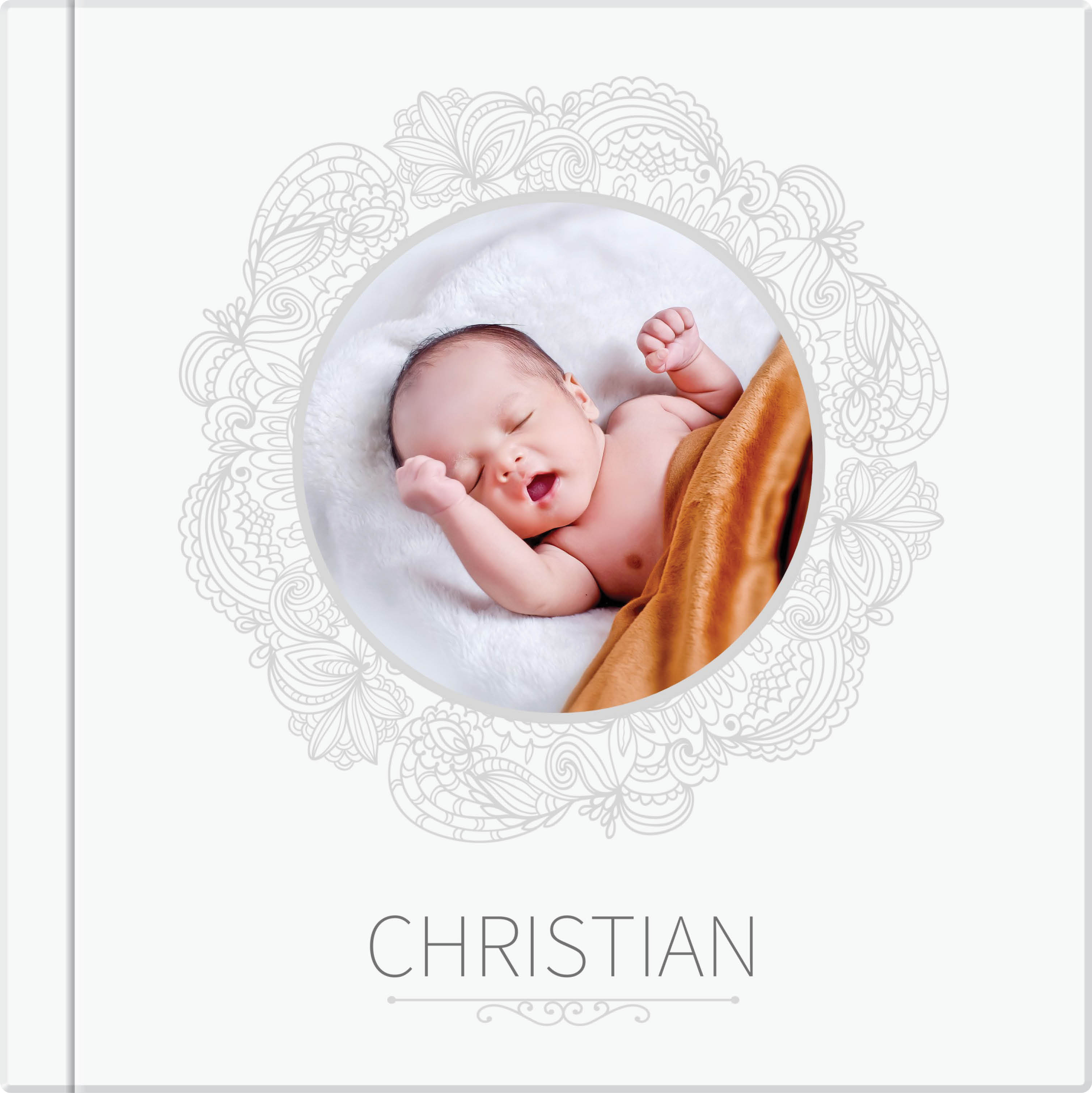 Photo album cover showing baby boy.