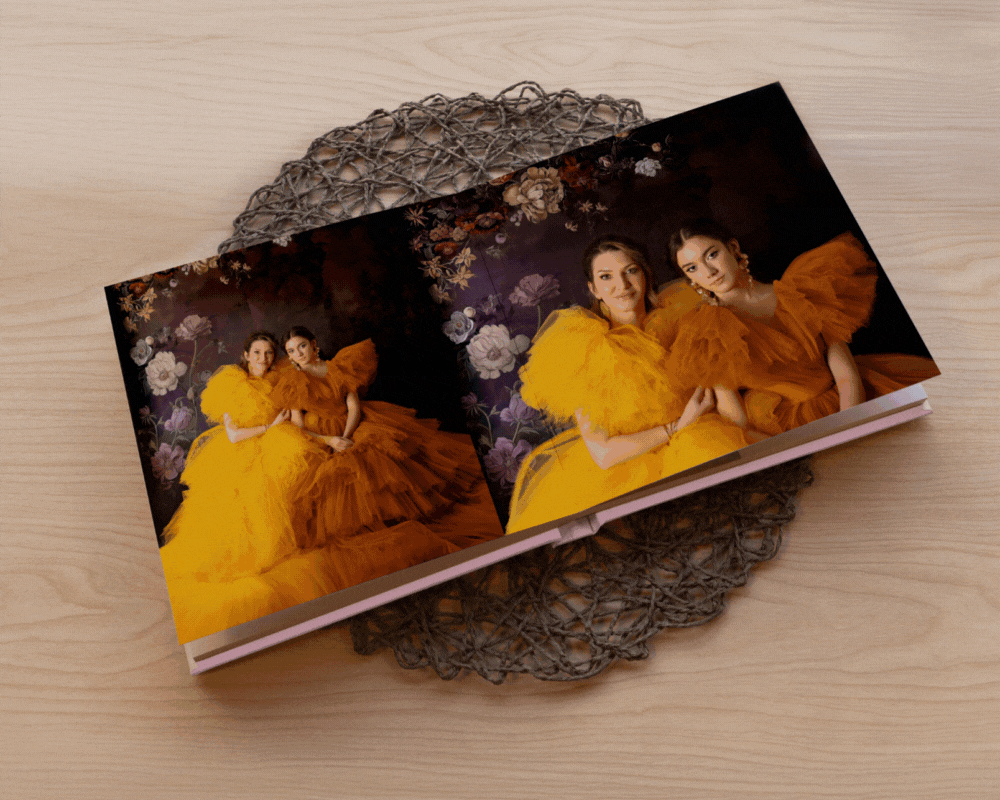 Animated flip-through of a layflat fine art photographer photo album featuring portraits of a mother and daughter, showcasing the Floral Dreams layout theme and rose linen cover.