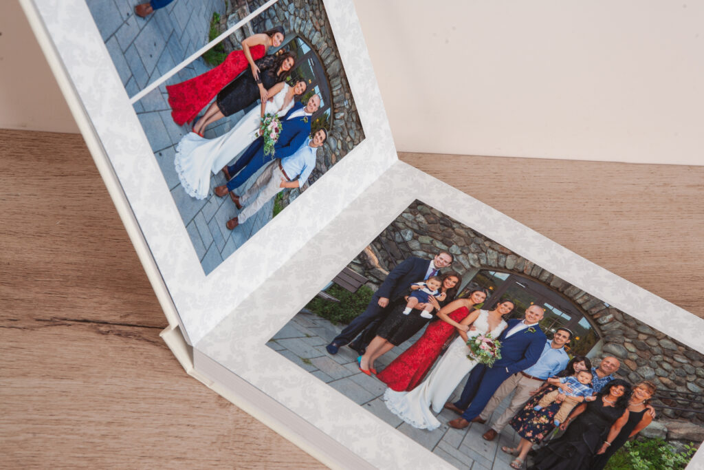 Side view of layflat wedding album with thick HD Eco Matte pages.