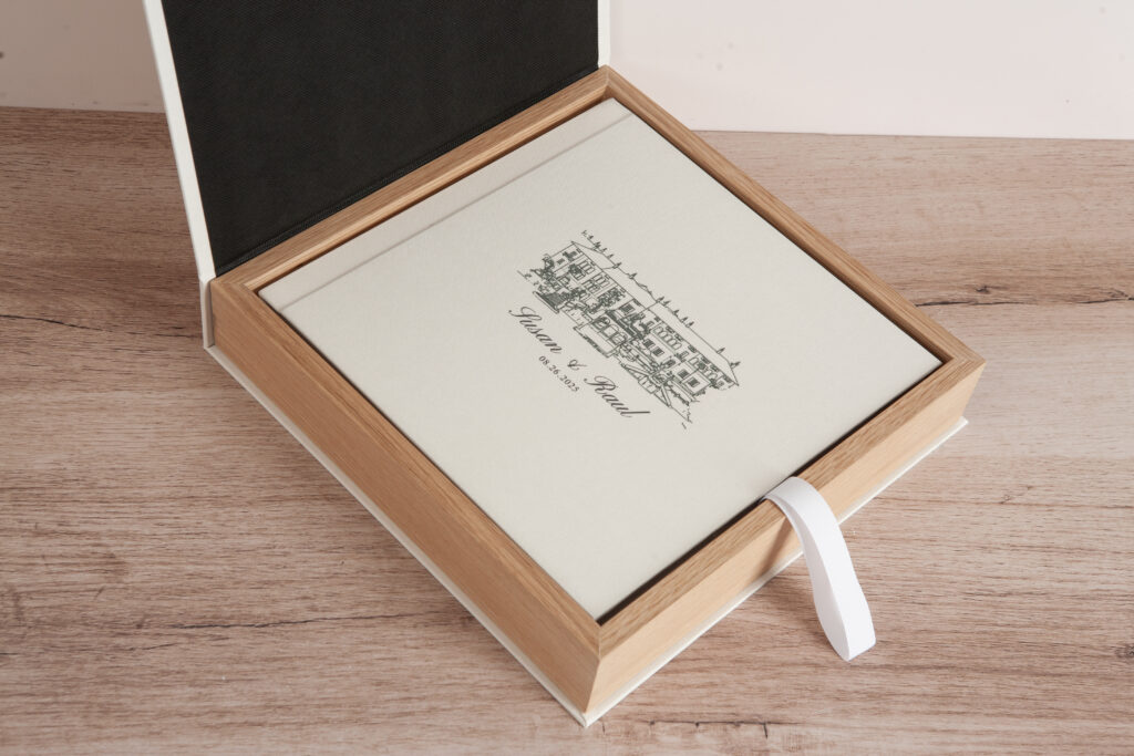 The perfect gift for a partner. A premium layflat wedding album in Linen Ivory with UV printed title and matching presentation box.
